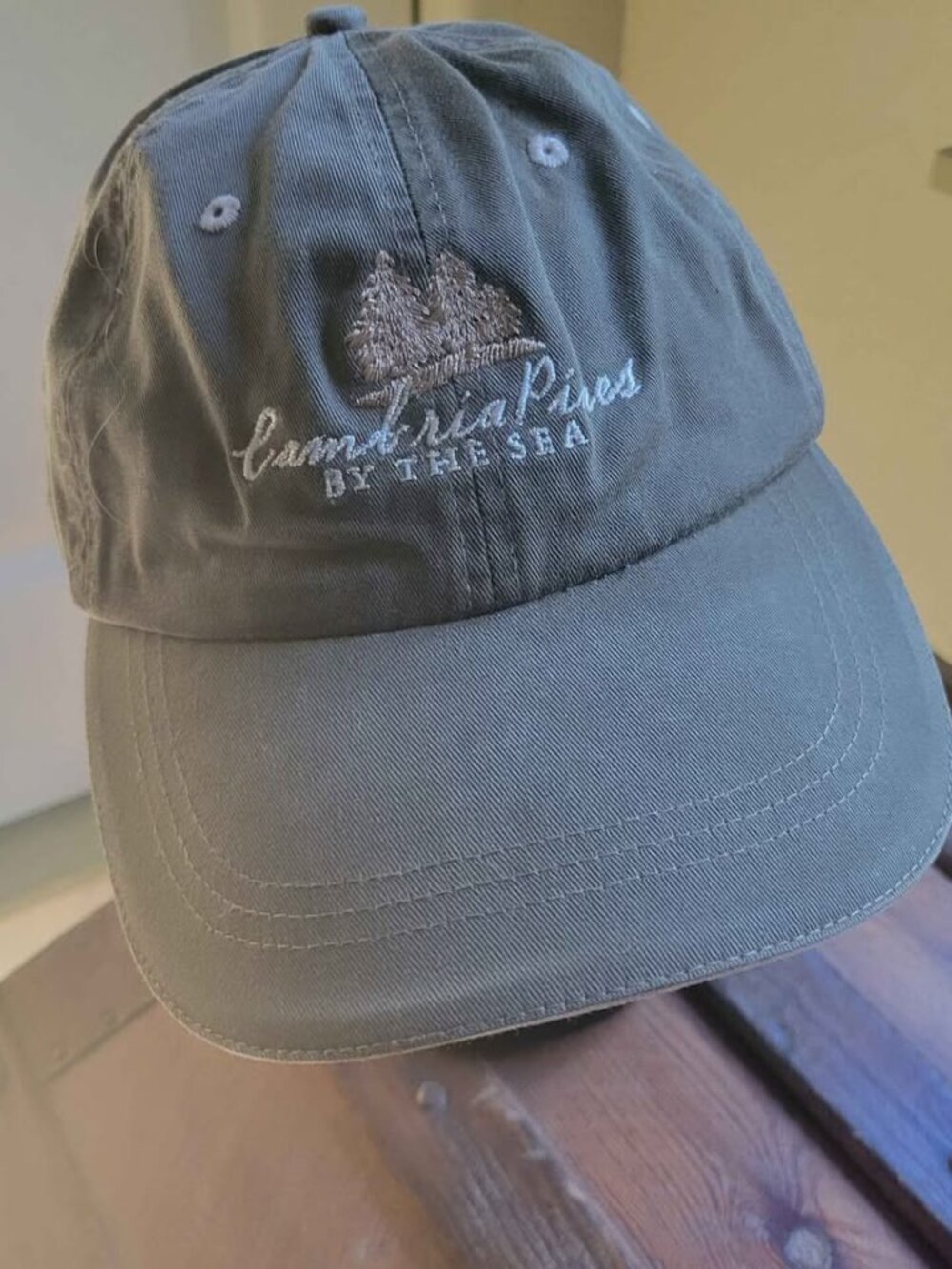 Men's or Women's Faded Light Green with embroidered Cambria Pines Baseball cap.
